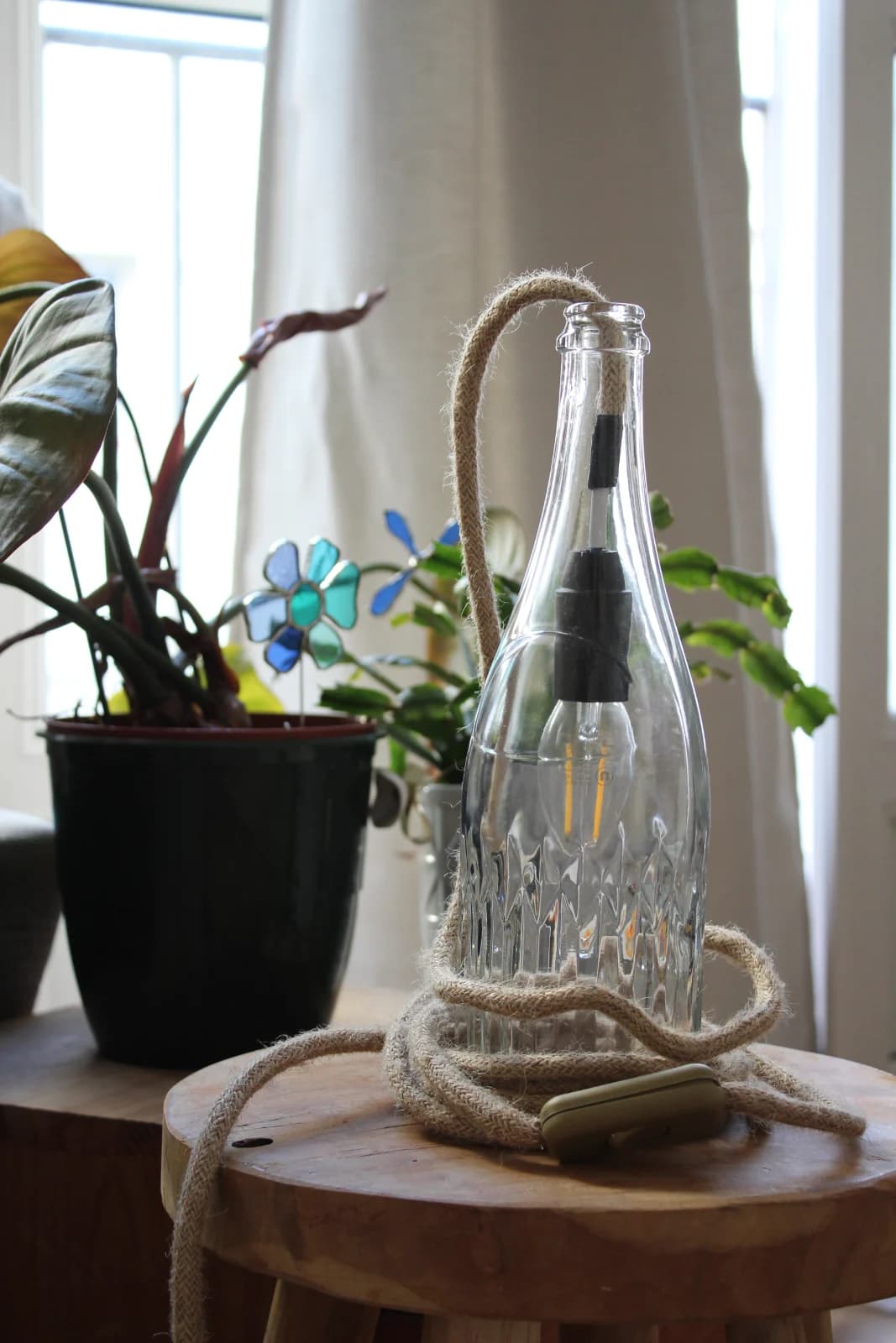 Lampe en bouteille de verre transparent